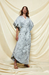 Jacquard dress with dramatic sleeves